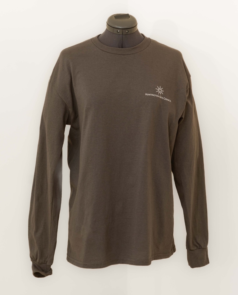 Product Description: Cotton long sleeve grey shirt with HAC logo printed in white on left chest and "Brighter Lives Through Art" printed down the right sleeve. Runs true to size</br> HAC "Brighter Lives through Art" Long Sleeve T